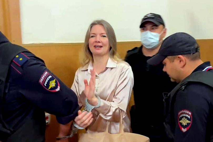 This video grab from a handout footage released by the Joint Press Service of Courts of Bashkortostan Republic shows Olga Komleva, 46, previously volunteered for Navalny's party, seen in Ufa City Court on July 29, 2025. Russia jailed for 12 years a journalist and former volunteer for late opposition activist Alexey Navalny, as Moscow outlaws any cooperation with Navalny's organisations -- even in the past. (Photo by Handout / JOINT PRESS SERVICE OF COURTS OF BASHKORTOSTAN REPUBLIC / AFP) / RESTRICTED TO EDITORIAL USE - MANDATORY CREDIT "AFP PHOTO / HANDOUT / JOINT PRESS SERVICE OF COURTS OF BASHKORTOSTAN REPUBLIC " - NO MARKETING NO ADVERTISING CAMPAIGNS - DISTRIBUTED AS A SERVICE TO CLIENTS